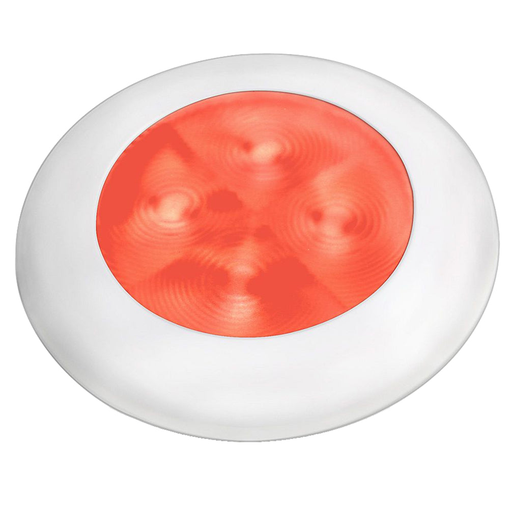 This is a white plastic bezel with a red plastic cover for LED lights. 